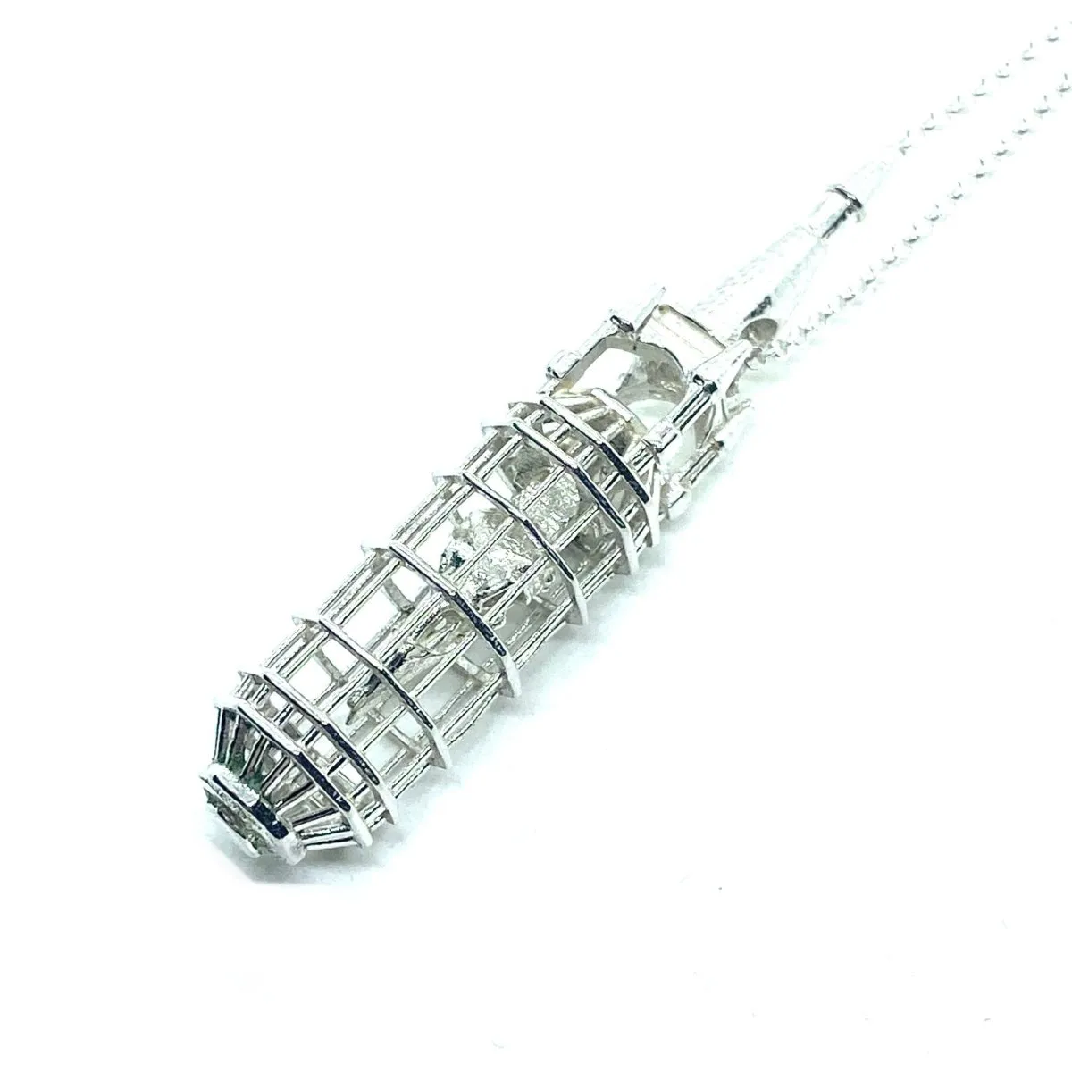 Caged Crow Skull Pendant In Sterling Silver