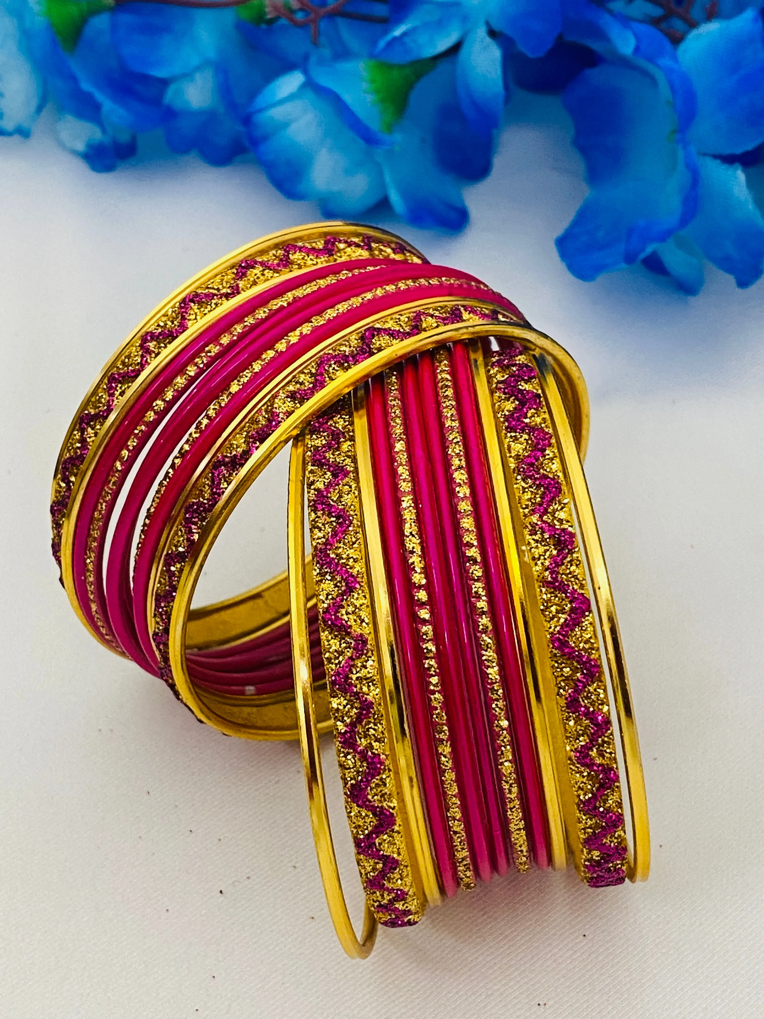 Gorgeous Traditional Pink Color Metal Bangles With Golden Glitters