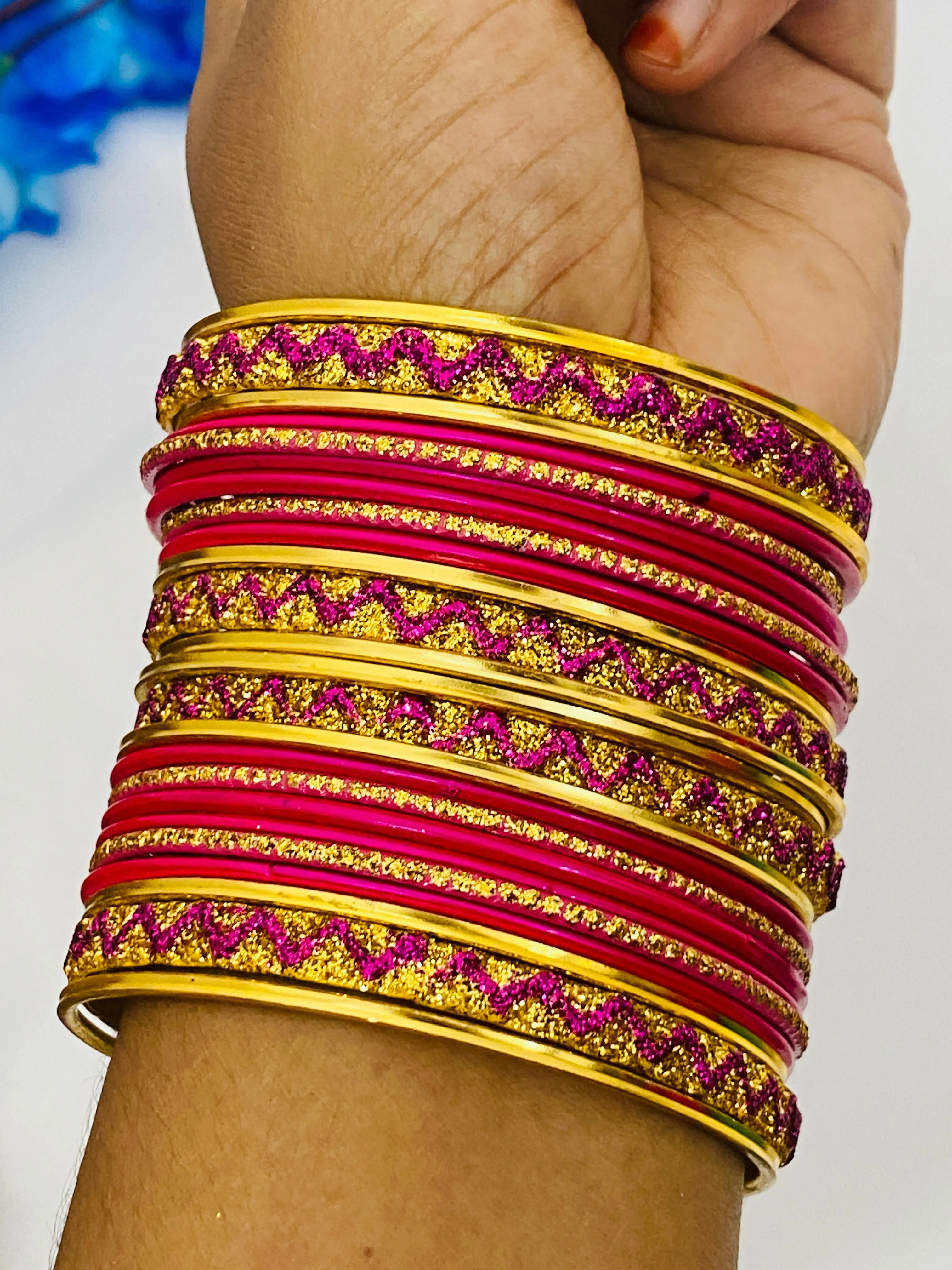 Gorgeous Traditional Pink Color Metal Bangles With Golden Glitters