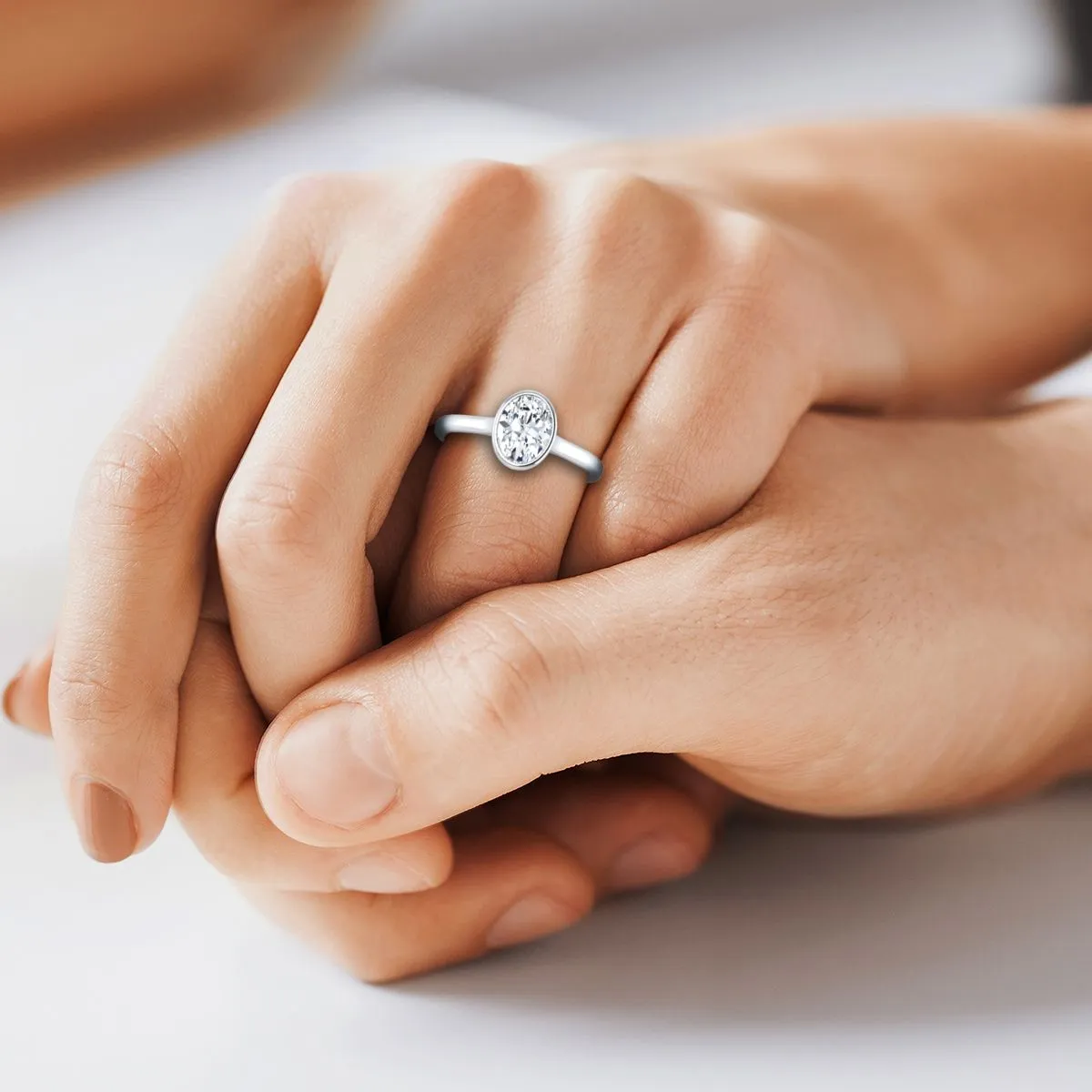 Platinum Oval Sapphire Simple Bezel Solitaire Engagement Ring