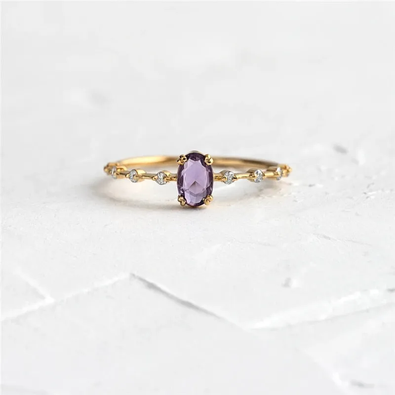 Simple Egg Shape Purple Crystal Gold Rings